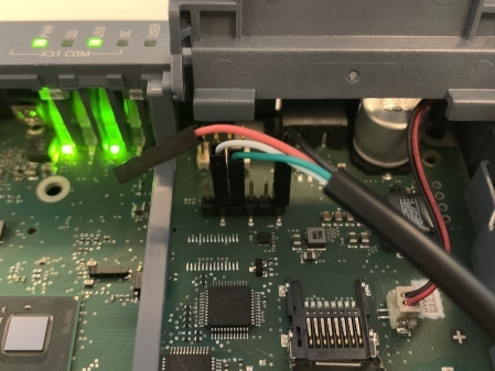 Example of connecting a USB-UART cable to a UART diagnostic connector